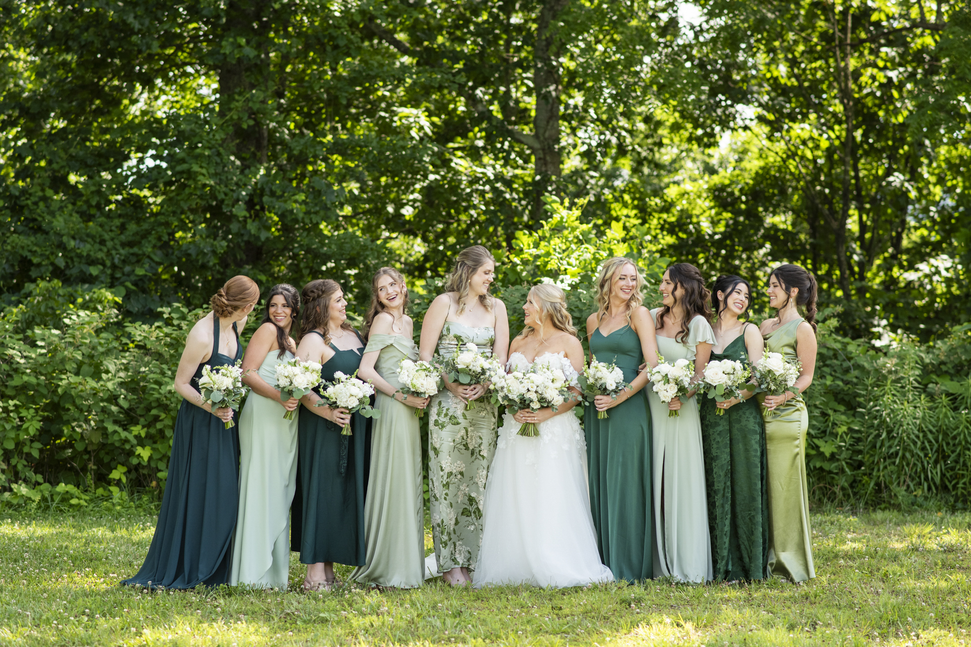 Bride and bridesmaids in green dresses
