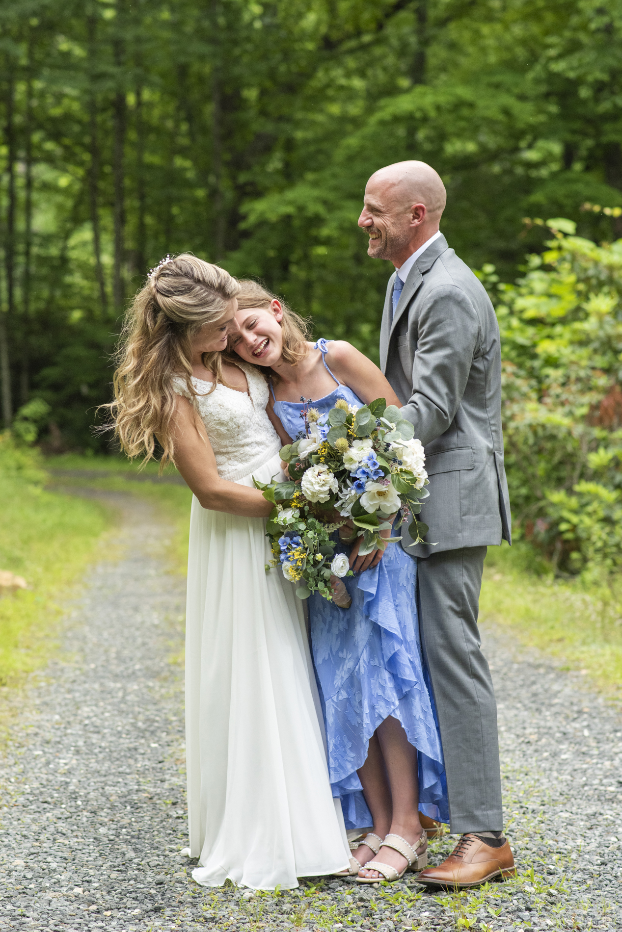 Mount Mitchell Wedding couple laughing with daughter
