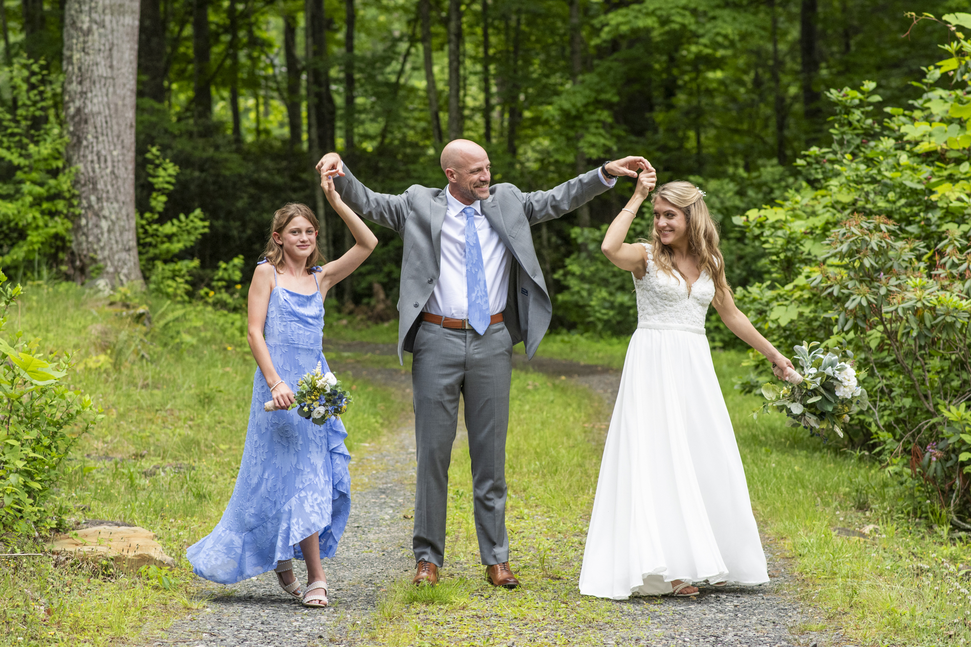Mount Mitchell Wedding couple dancing with daughter
