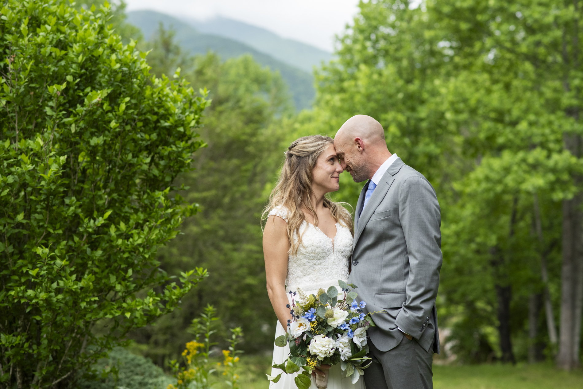 couple snuggling at mount mitchell wedding