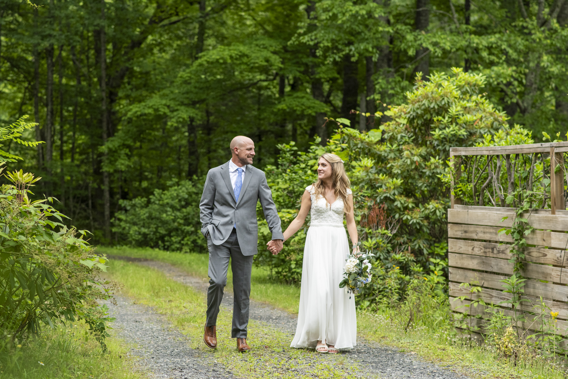 couple walking at wedding at Mount Mitchell Wedding
