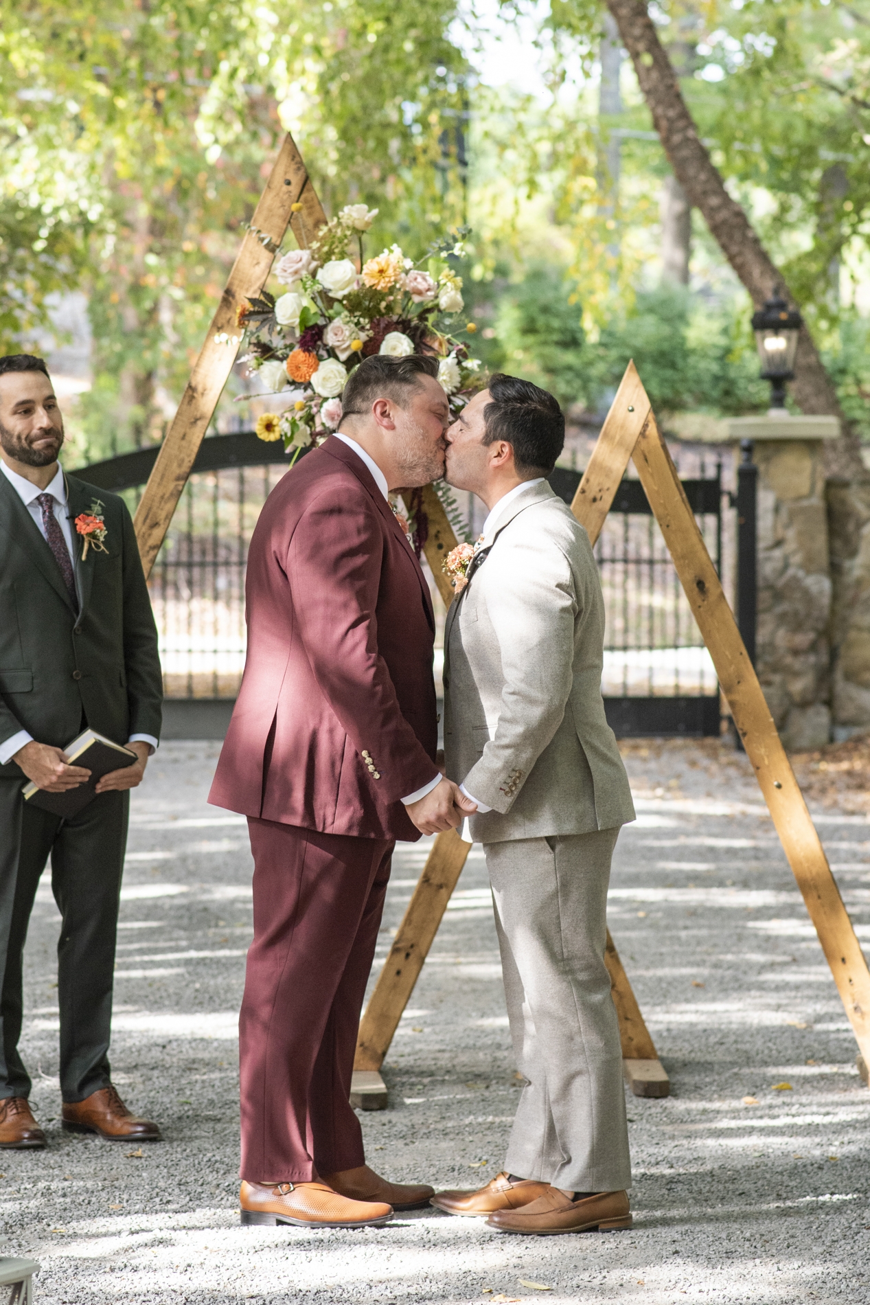 First kiss at wedding ceremony at Hawkesdene Estate