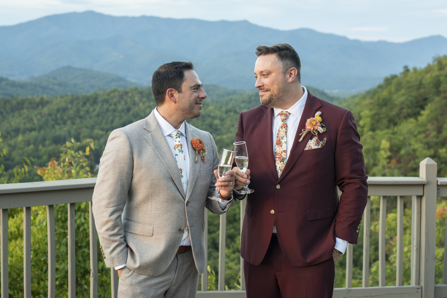 Couple cheers on mountain top at Hawkesdene Estate wedding