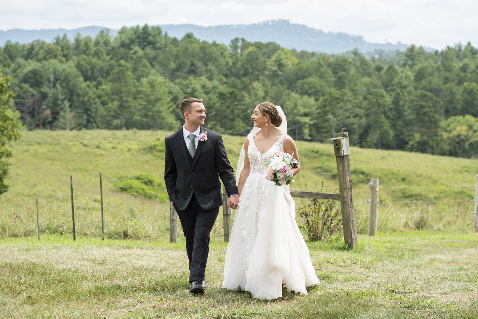 couple walking at Emerald Ridge Wedding