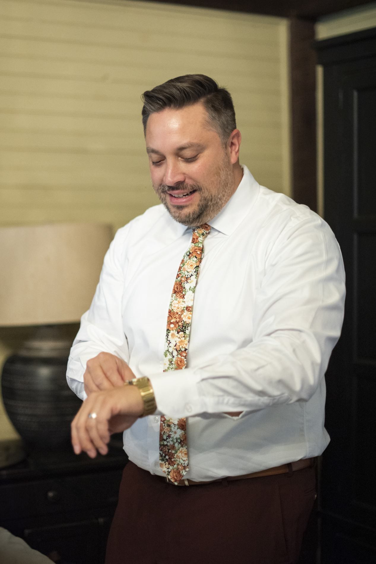 Groom getting ready at wedding
