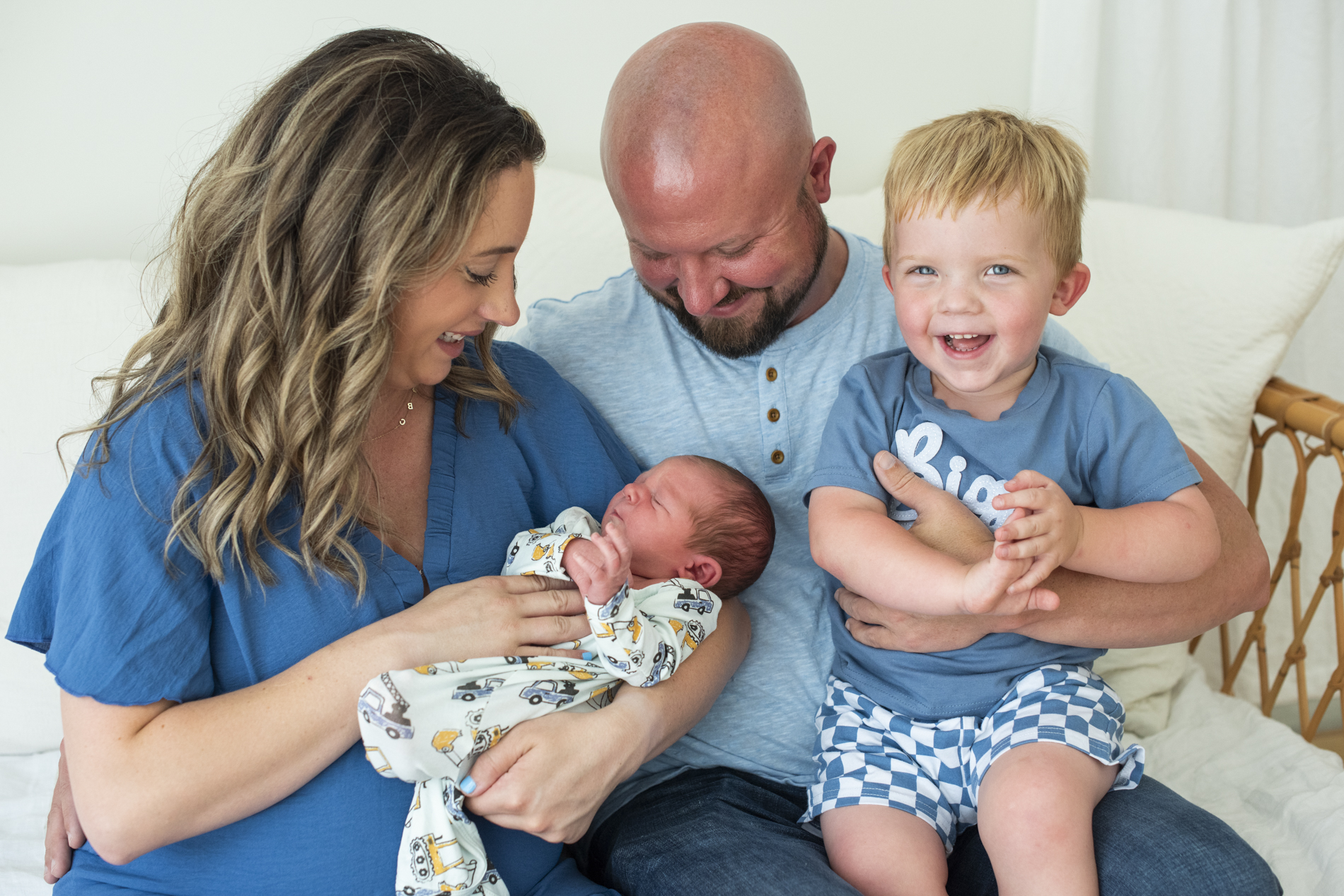 family holding newborn baby in newborn photography Asheville NC