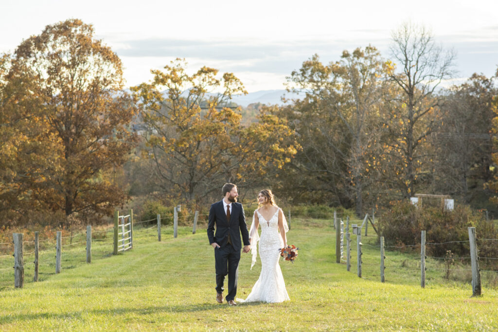 Emerald Ridge Asheville NC couple walking at wedding