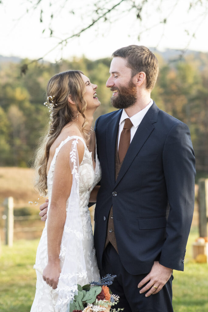 couple laughing at wedding at Emerald Ridge Asheville NC