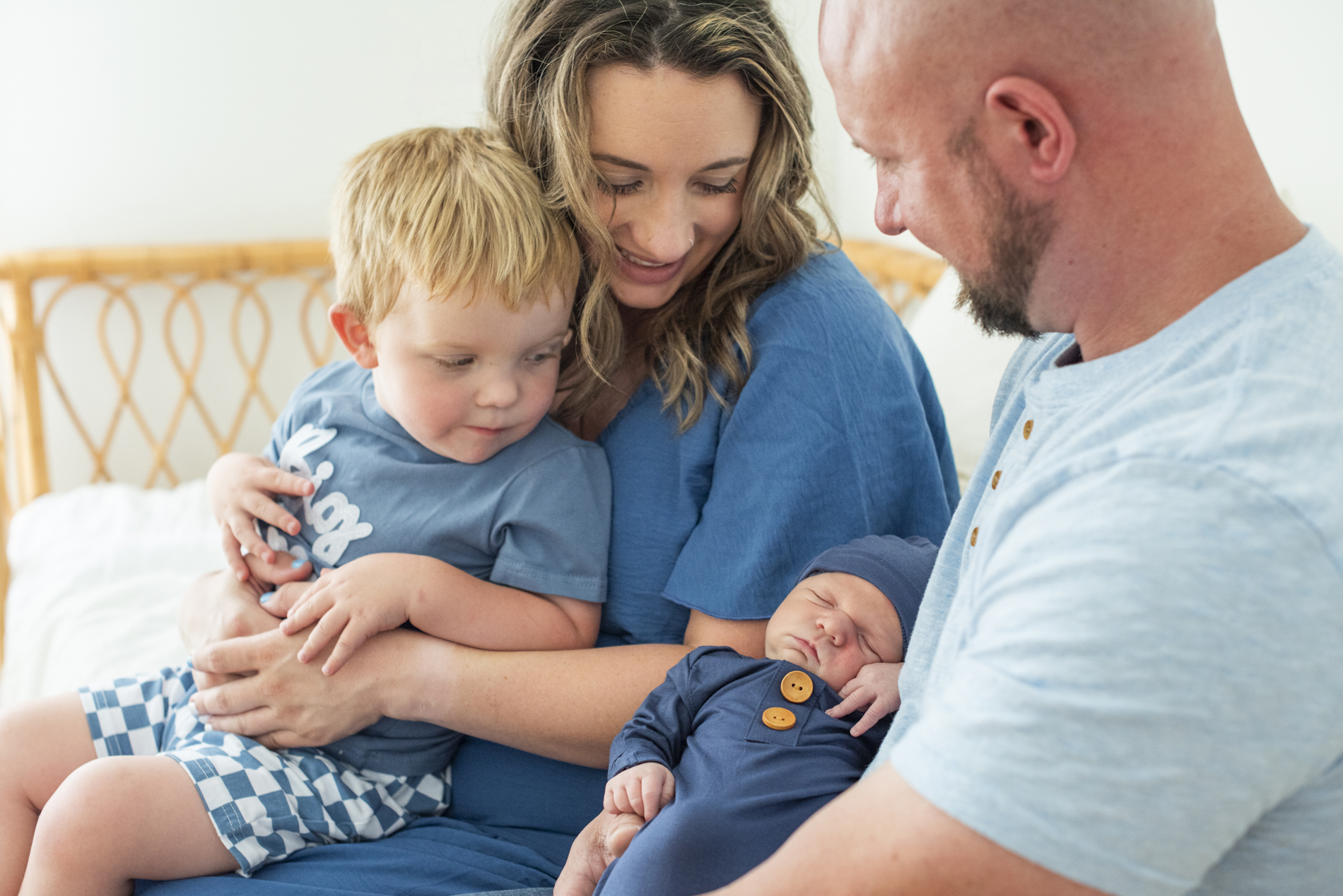 family holding newborn baby in newborn photography Asheville NC