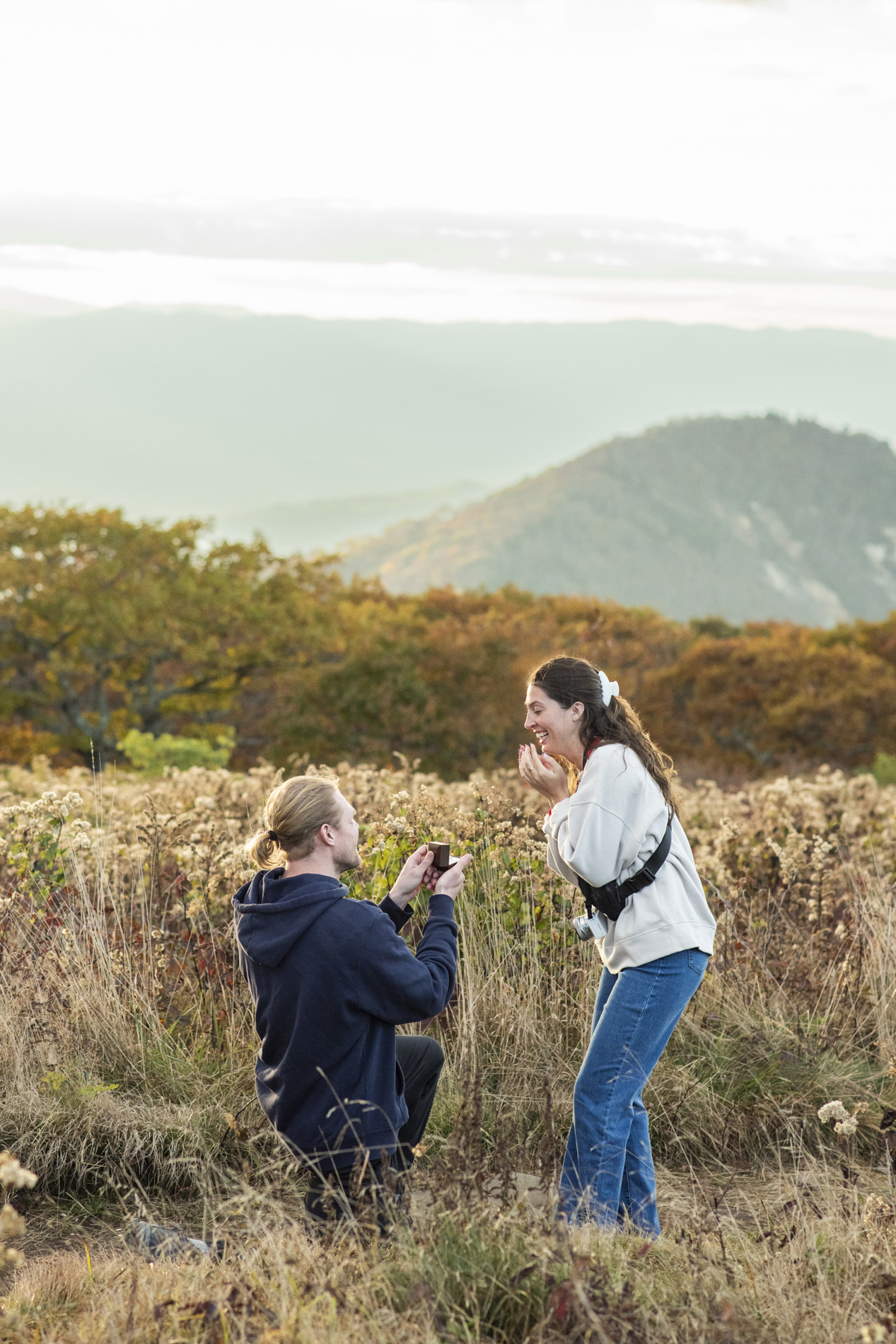 Proposal on mountain top with Asheville proposal photographer