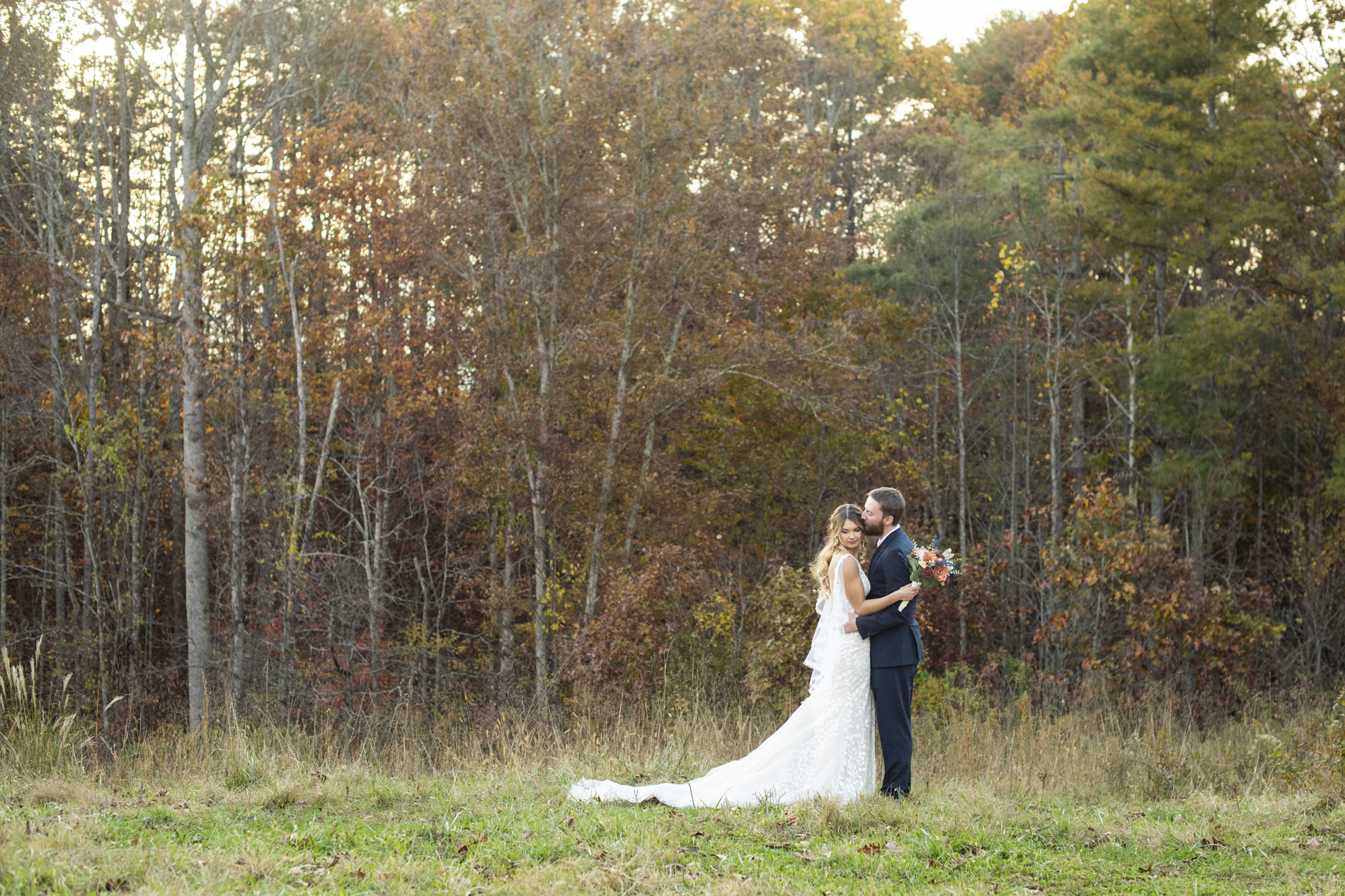 couple snuggling during asheville elopement