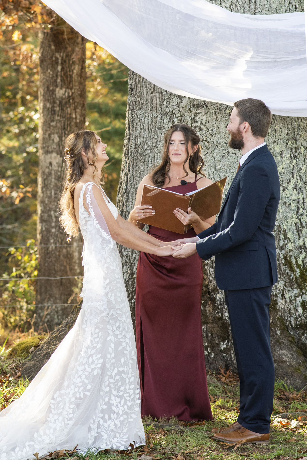 couple laughing during ceremony at asheville elopement