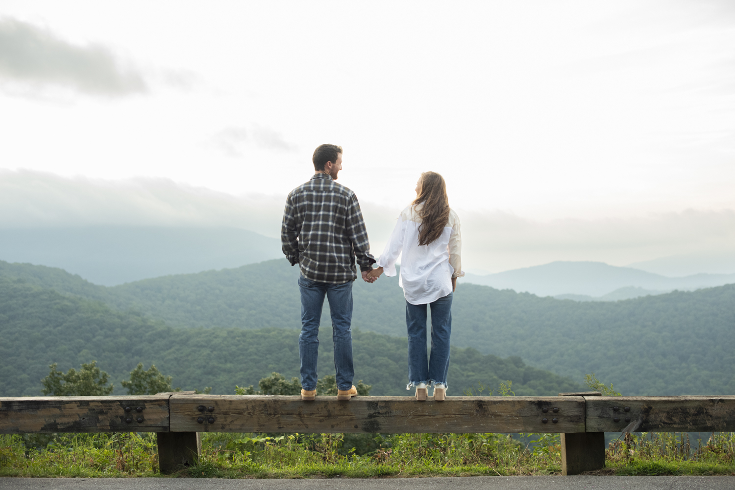 Blue Ridge Parkway Engagement photo of couple holding hands