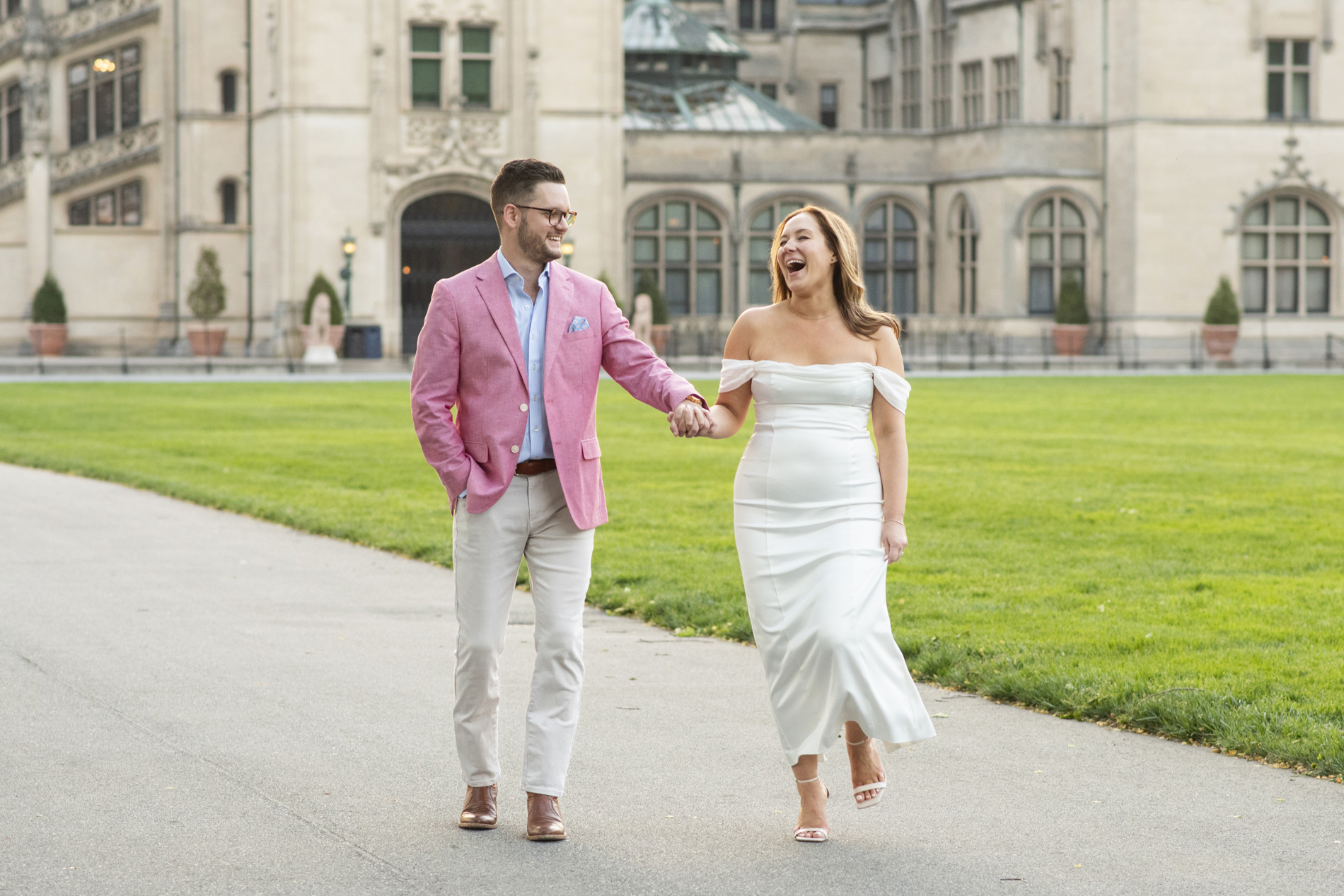 Couple walking and laughing at Biltmore Estate in Asheville, NC