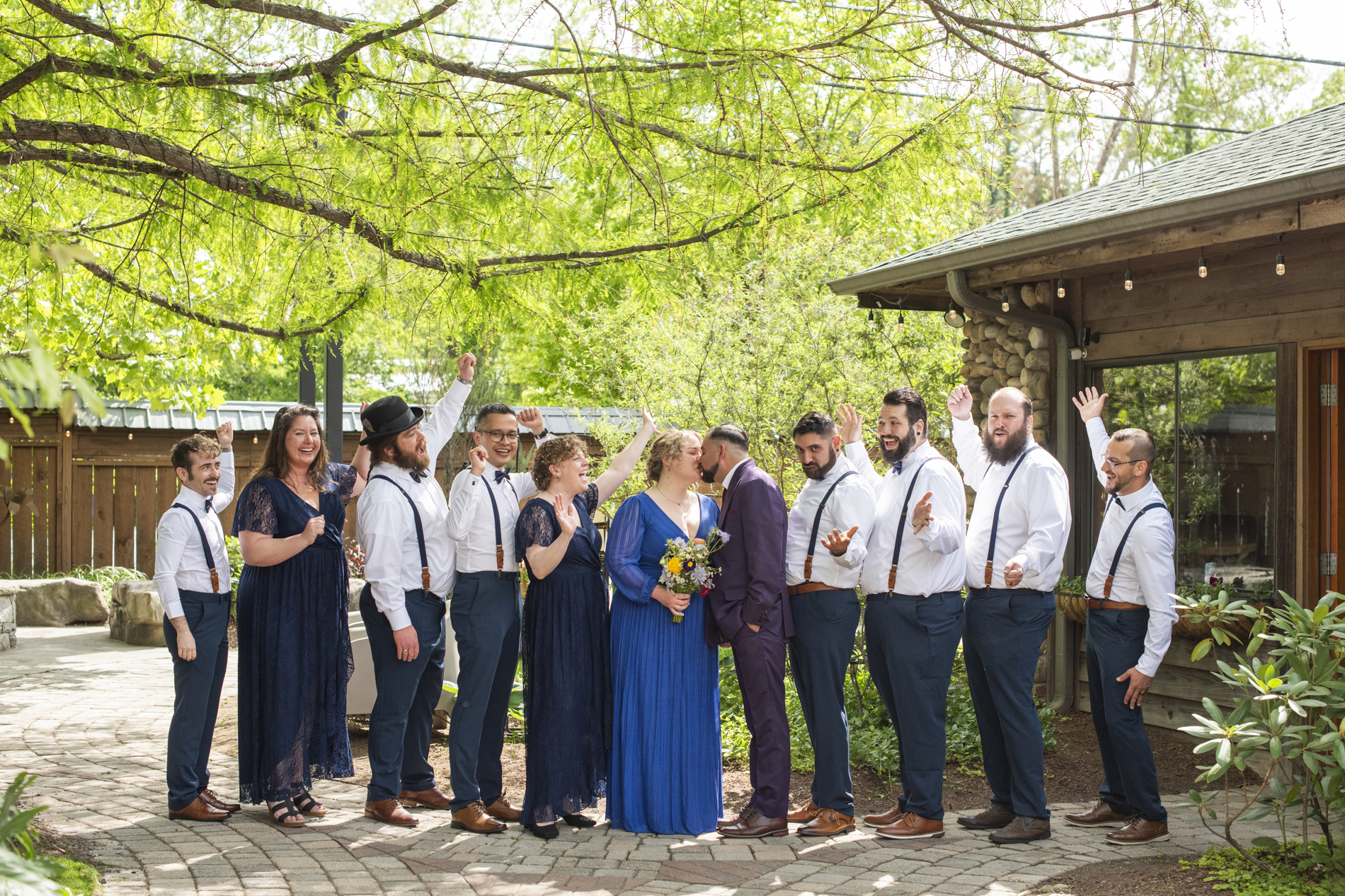 Wedding party cheering at Haiku Asheville