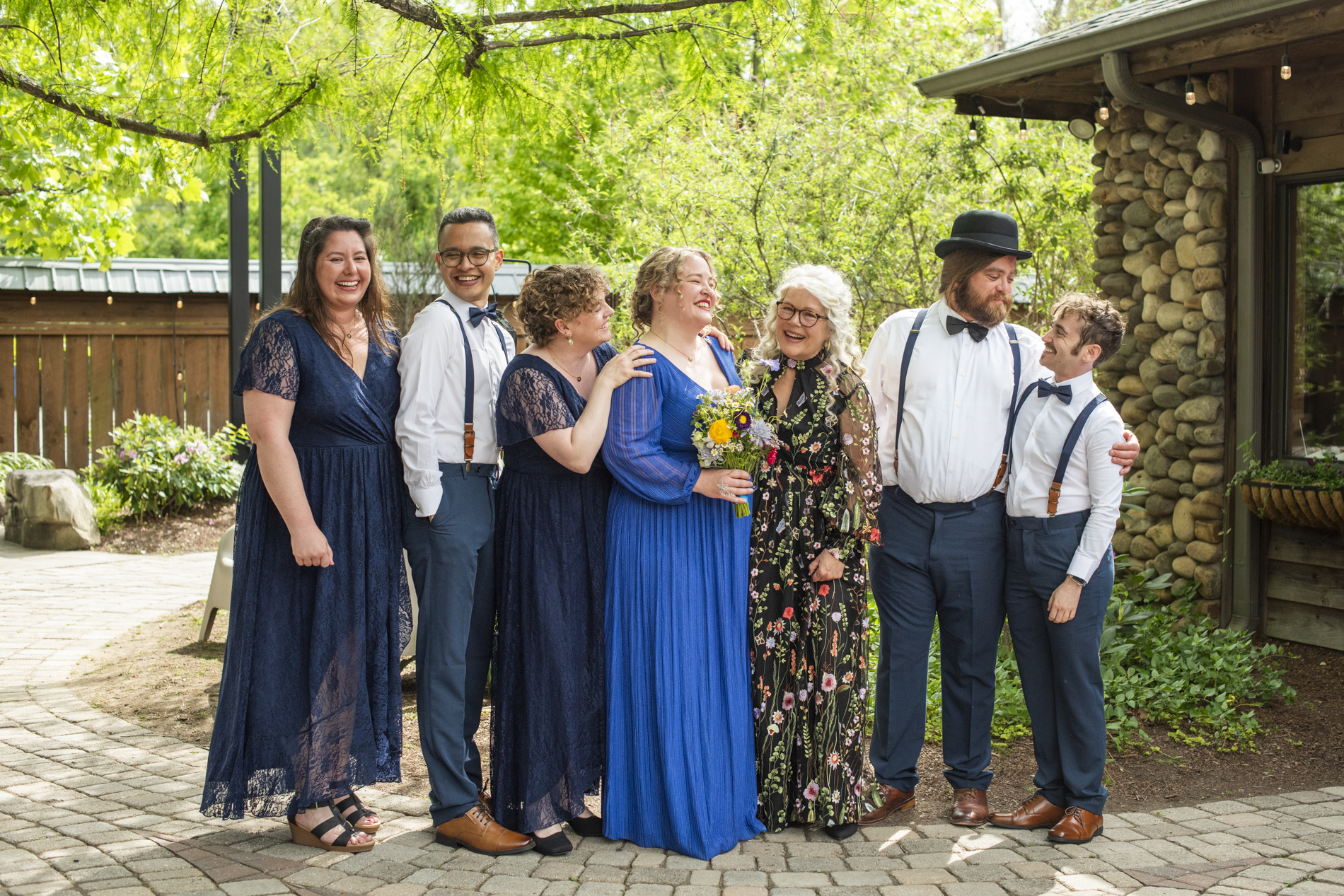 Bride and attendants laughing together