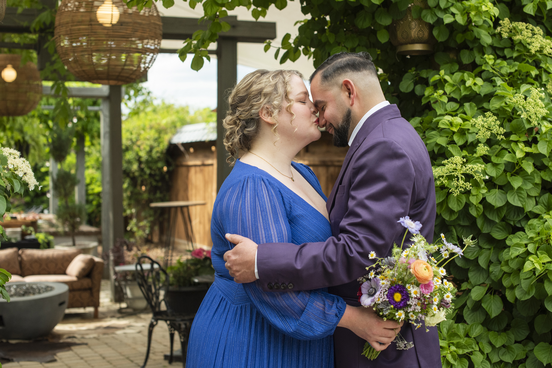 Bride kissing groom on the nose at Haiku Asheville