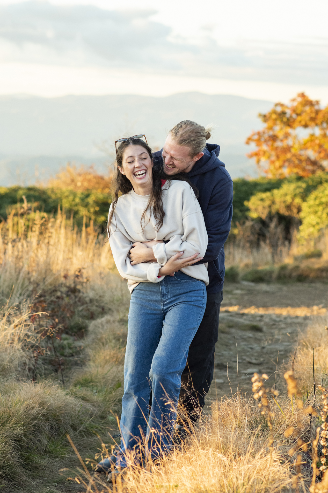 Couple laughing during Engagement Proposal Planning Asheville