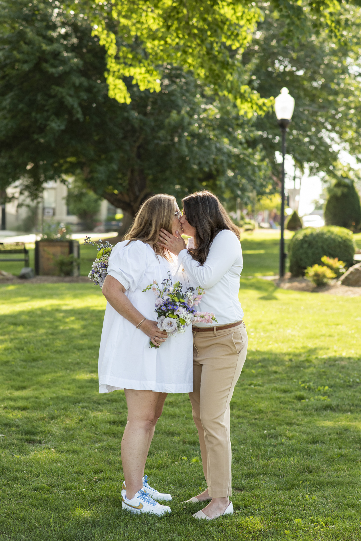 Couple kissing in Burnsville, NC town square