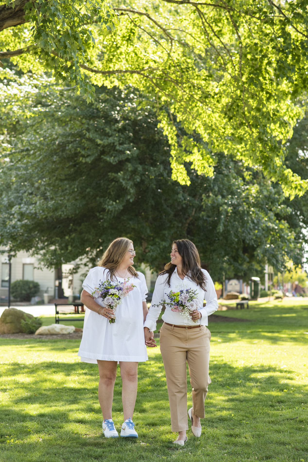 Couple walking in Burnsville, NC town square