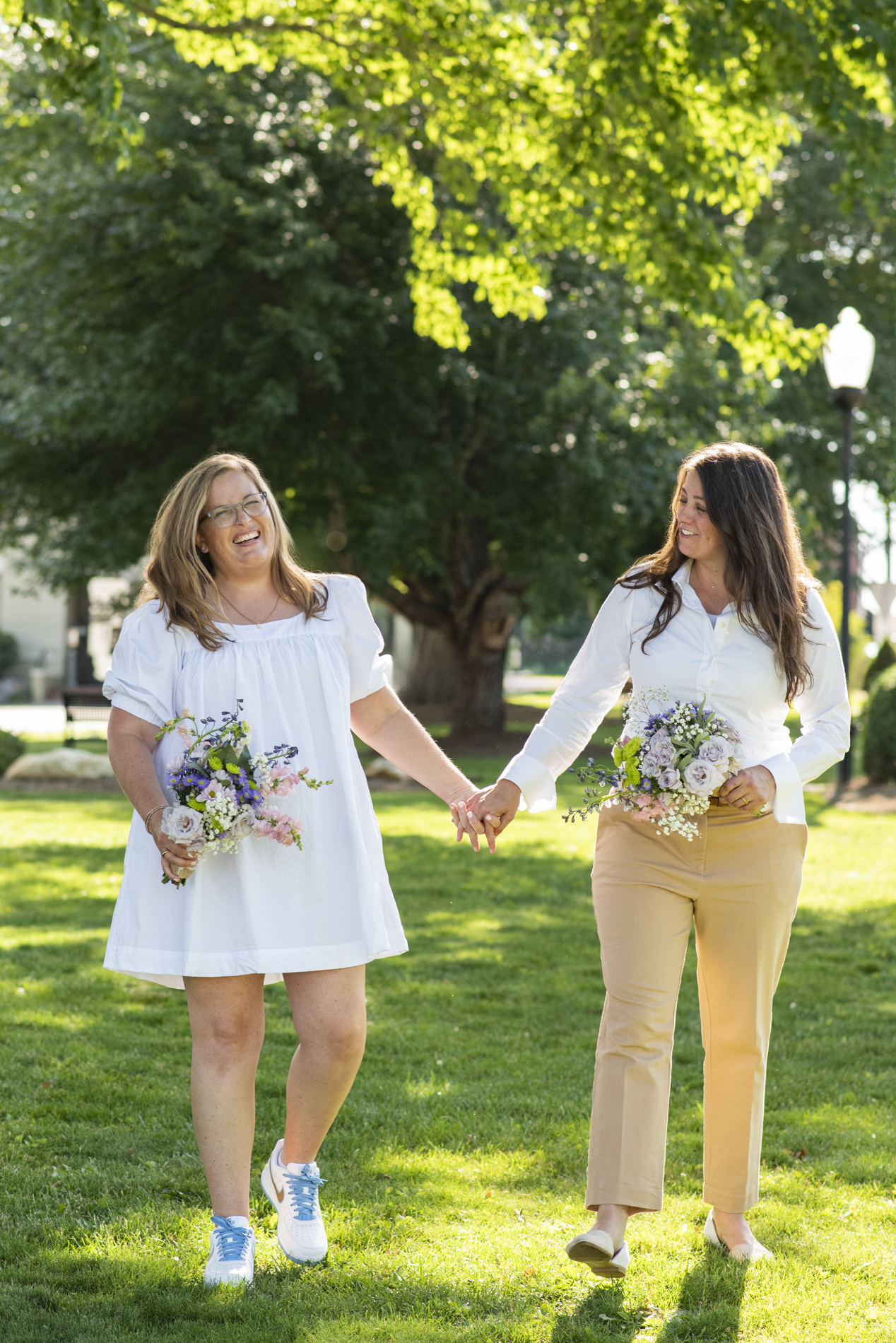 Couple walking in Burnsville, NC town square LGBTQ
