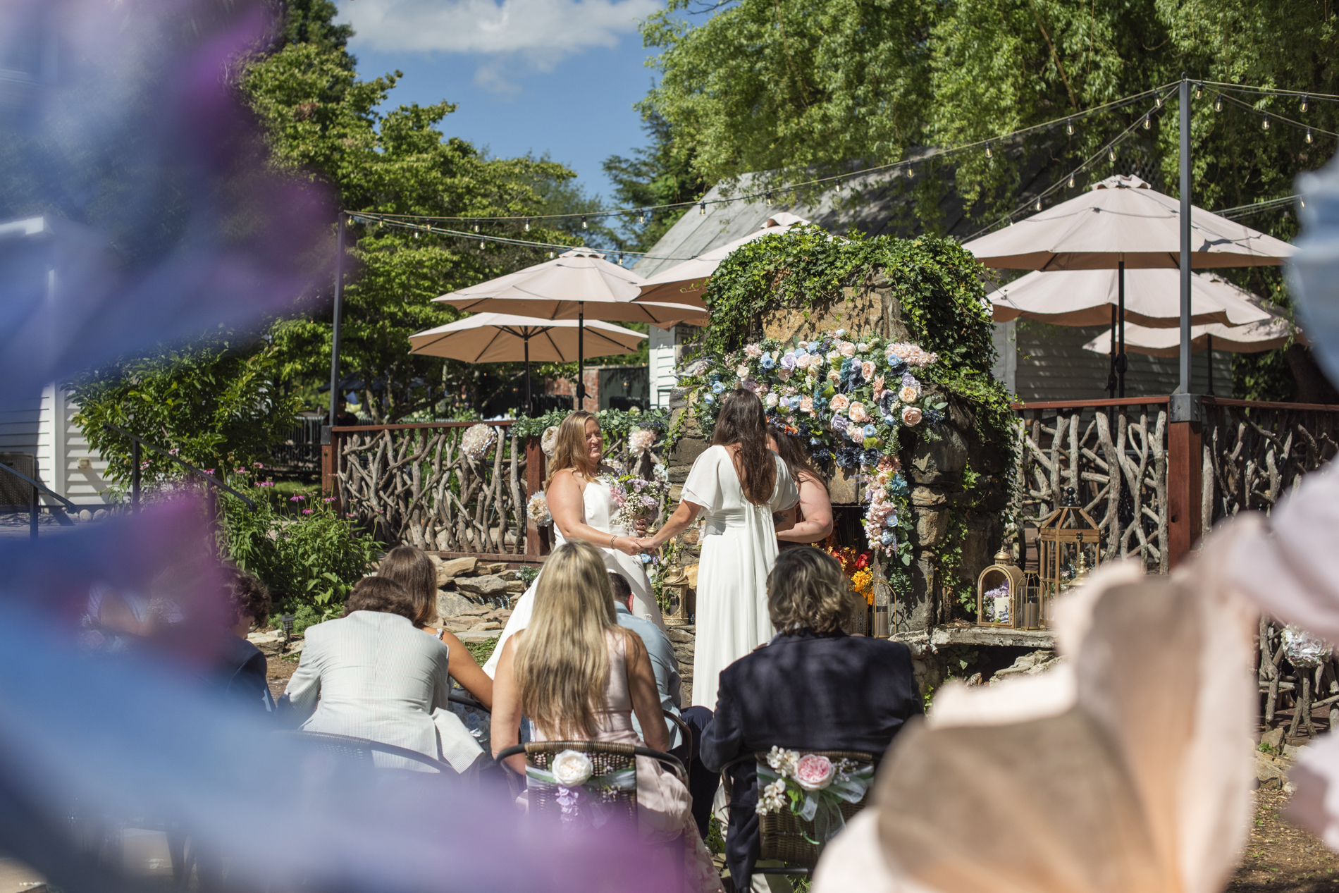 Ceremony at NuWray Hotel wedding LGBTQ
