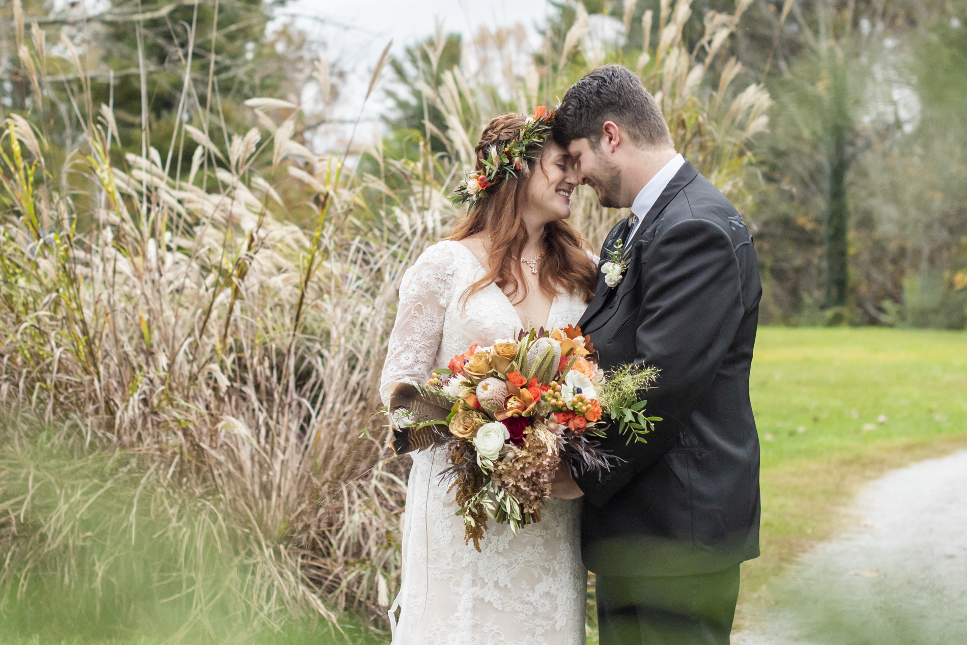 couple snuggling at wedding at highland lake inn