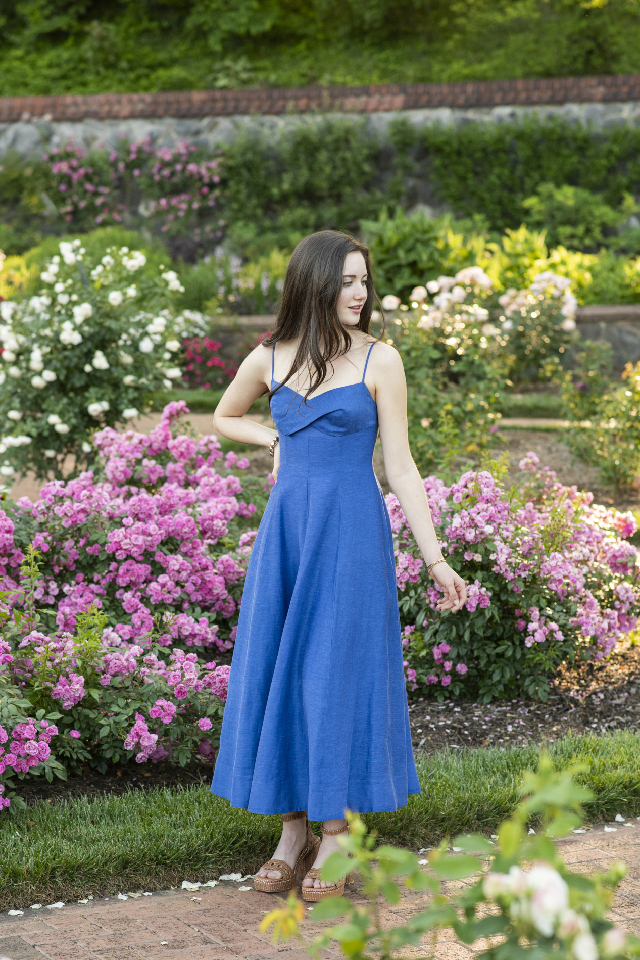 graduating senior at biltmore estate in rose garden