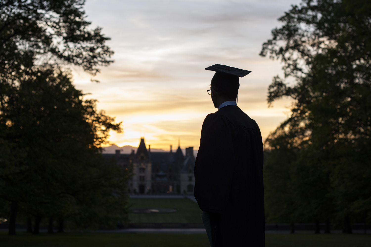 senior photos at biltmore estate at sunset