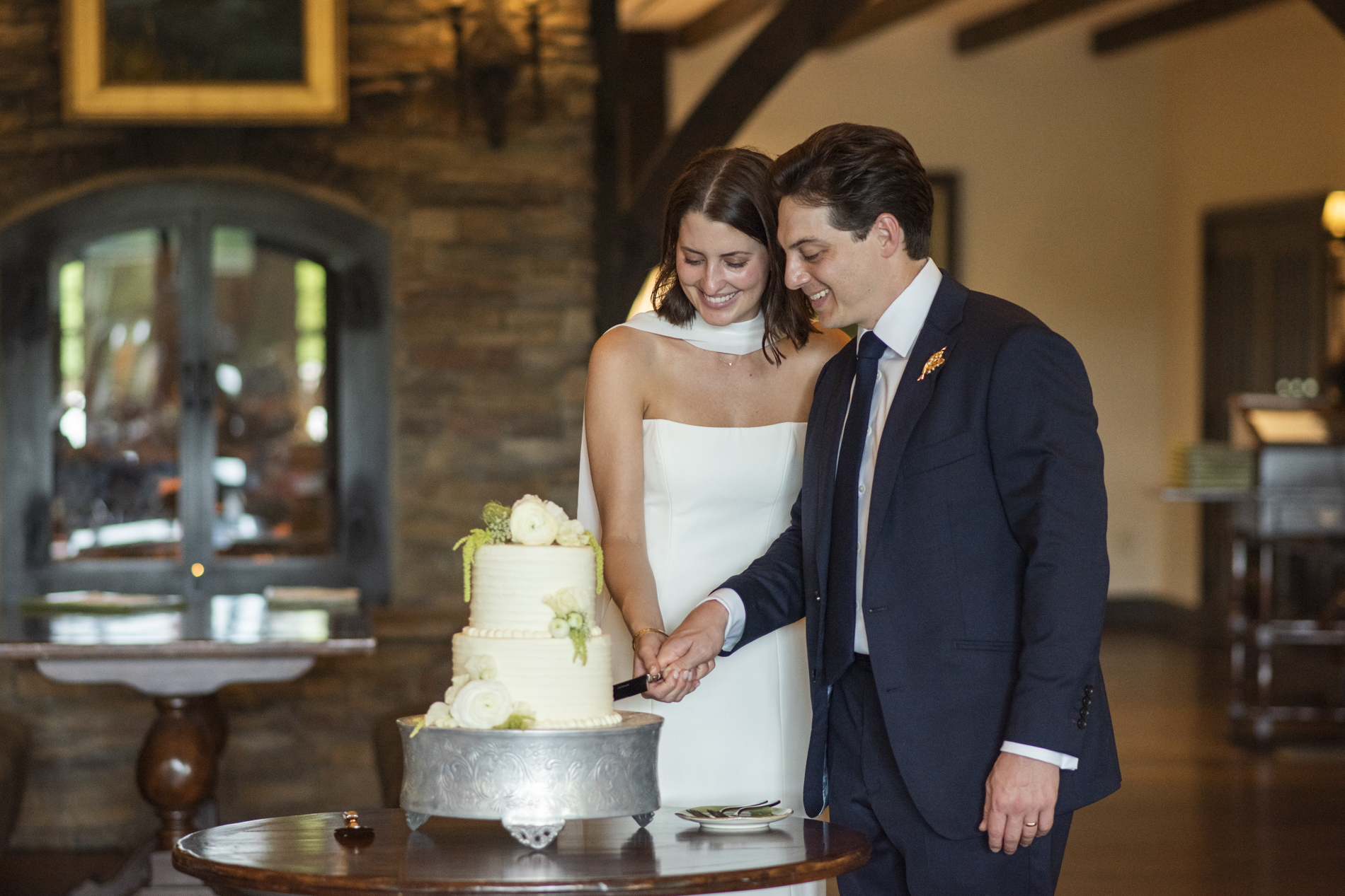 couple cutting cake