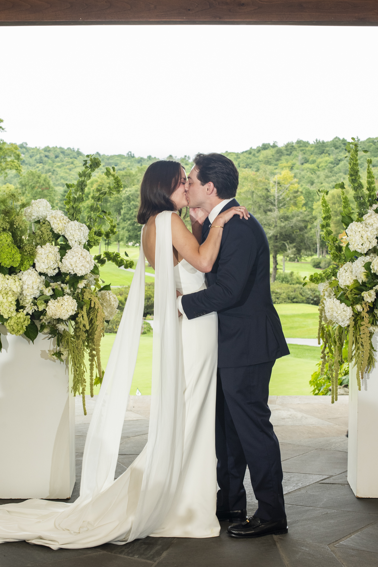 Wedding first kiss at Old Edwards Club in Cashiers, NC